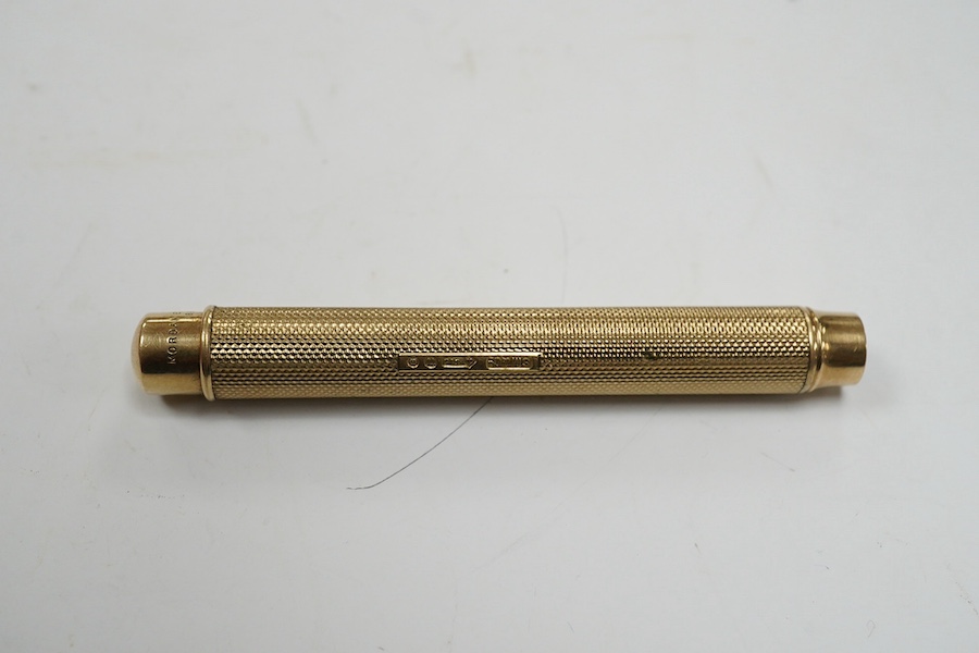 A George V 9ct gold cased propelling pencil by Sampson Mordan & Co, London, 1928. Condition - fair to good